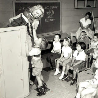 Angel Casey and Bruce Newton on a live remote in a Chicago public school, guiding the kids through a mock election.